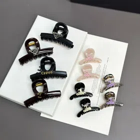 Chanel Prada updo with hair clip at the back of the head-6242